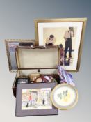 A vintage luggage case containing assorted pictures and prints, gilt framed mirror,