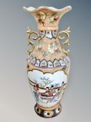 A Japanese porcelain vase depicting Geisha,
