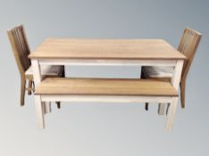 An Ikea Kejsarkrona kitchen table with pair of chairs and matching bench