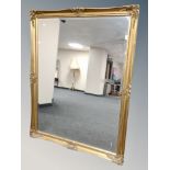 A contemporary gilt bevelled mirror,