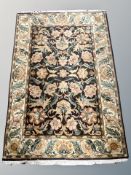An Indian floral rug,