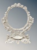 An antique style cast metal dressing table mirror frame,