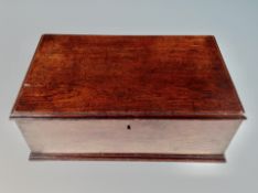 An antique mahogany compartmented table box