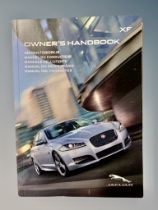 Ten Jaguar XF Driver's Manuals/Owner Booklets in Original Wallets.