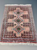 A Caucasian design rug of Pakistani origin 212 cm x 114 cm