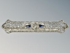 A 14ct white gold Art Deco sapphire and diamond brooch, length 55mm.