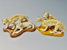 Two contemporary resin leopard groups