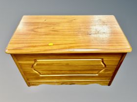 A contemporary pine blanket box width 70 cm