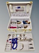 A contemporary jewellery chest and contents to include coin bracelet, costume jewellery,