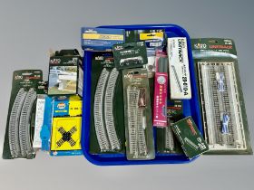 A group of Kato Unitrack and other model railway building components