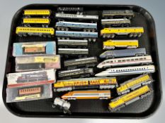 A group of mainly unboxed N scale die cast locomotives and rolling stock including Bachmann,