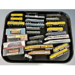 A group of mainly unboxed N scale die cast locomotives and rolling stock including Bachmann,