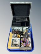 A contemporary mirrored jewellery chest and quantity of costume jewellery