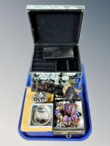 A contemporary mirrored jewellery chest and quantity of costume jewellery