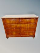A 19th century Continental mahogany chest of four drawers width 111 cm