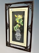 A framed oriental embroidered panel,