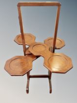 An Edwardian mahogany monoplane cake stand