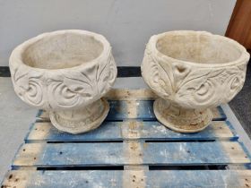 A pair of concrete arcanthus leaf garden urns height 38 cm