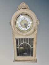 An oak eight day wall clock