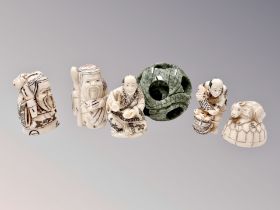 Five Japanese carved bone and penwork netsukes/okimonos,