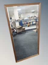 A contemporary rectangular bevelled mirror,