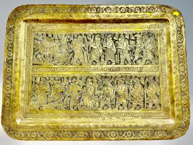 A heavily engraved eastern brass tray,