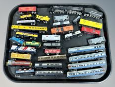 A group of unboxed N scale locomotives and rolling stock including Atlas,