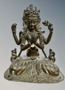 A 19th century Indo-Tibetan bronze devotional figure, height 11cm.