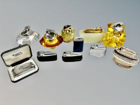 A group of table and pocket lighters