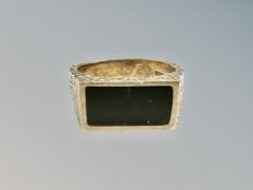 A gent's 9ct gold onyx signet ring, size O CONDITION REPORT: 6.