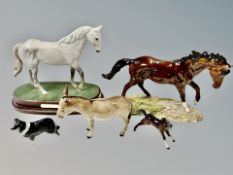 A bisque porcelain figures of Desert Orchid on plinth together with two Royal Doulton horses,
