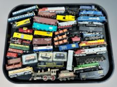 A group of N scale unboxed die cast locomotives and rolling stock including Bachmann,