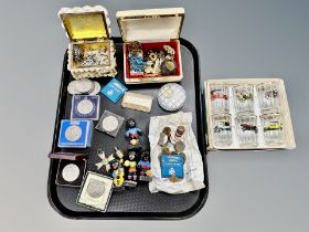 Two jewellery boxes containing costume jewellery, several coins and crowns,