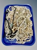 A large amount of a faux and cultured pearls