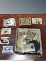 A box of brass plaques relating to car shows and classic car rally's,