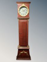 A continental painted and gilded longcase clock with pendulum and weights CONDITION