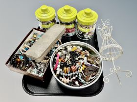 Three kitchen storage jars and two further boxes containing costume jewellery,