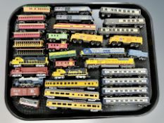 A group of N scale die cast locomotives and rolling stock including Con-cor,