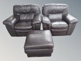 A pair of contemporary brown leather oversized armchairs and matching footstool
