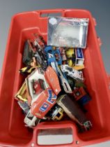A quantity of boxed and unboxed die cast cars,