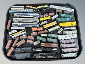 A group of unboxed N scale die cast locomotives and rolling stock including Bachmann,