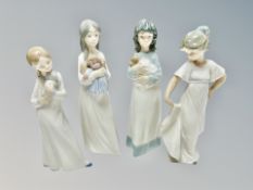 Four Nao girl figures