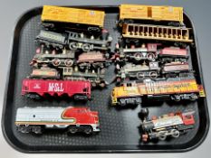 A group of HO scale die cast locomotives and rolling stock including Bachmann,