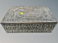 A heavily carved Anglo Indian jewellery box