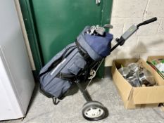 A Howson golf trolley containing irons,