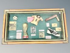 A framed football montage 55 cm by 31 cm