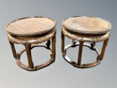 A pair of 19th century Chinese carved rosewood jardiniere stands,