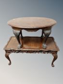 Two shaped walnut coffee tables together with a Queen Anne style chair