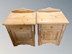 A pair of washed pine bedside cabinets,
