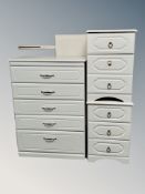 A contemporary white five drawer chest,